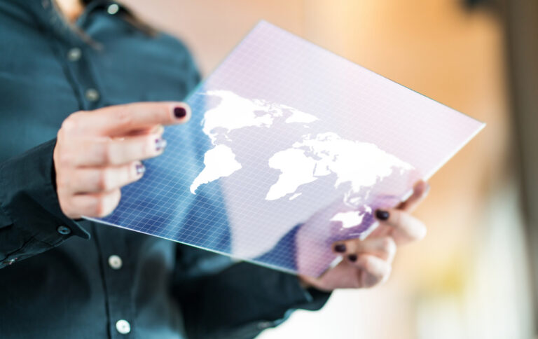 Modern,Global,And,International,Business,Technology,Concept.,Businesswoman,Using,Futuristic